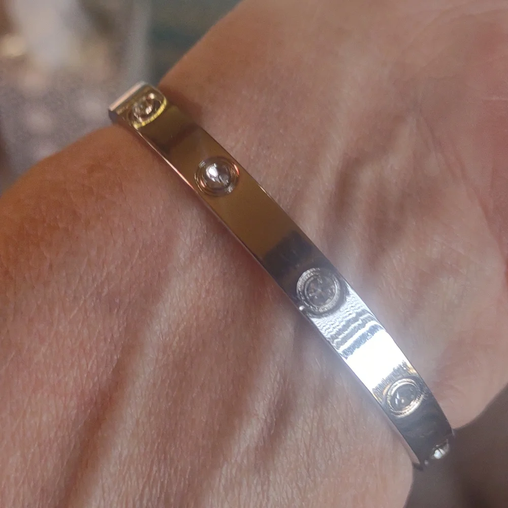 Bangle bracelet with czs all around it. - Picture 2 of 4